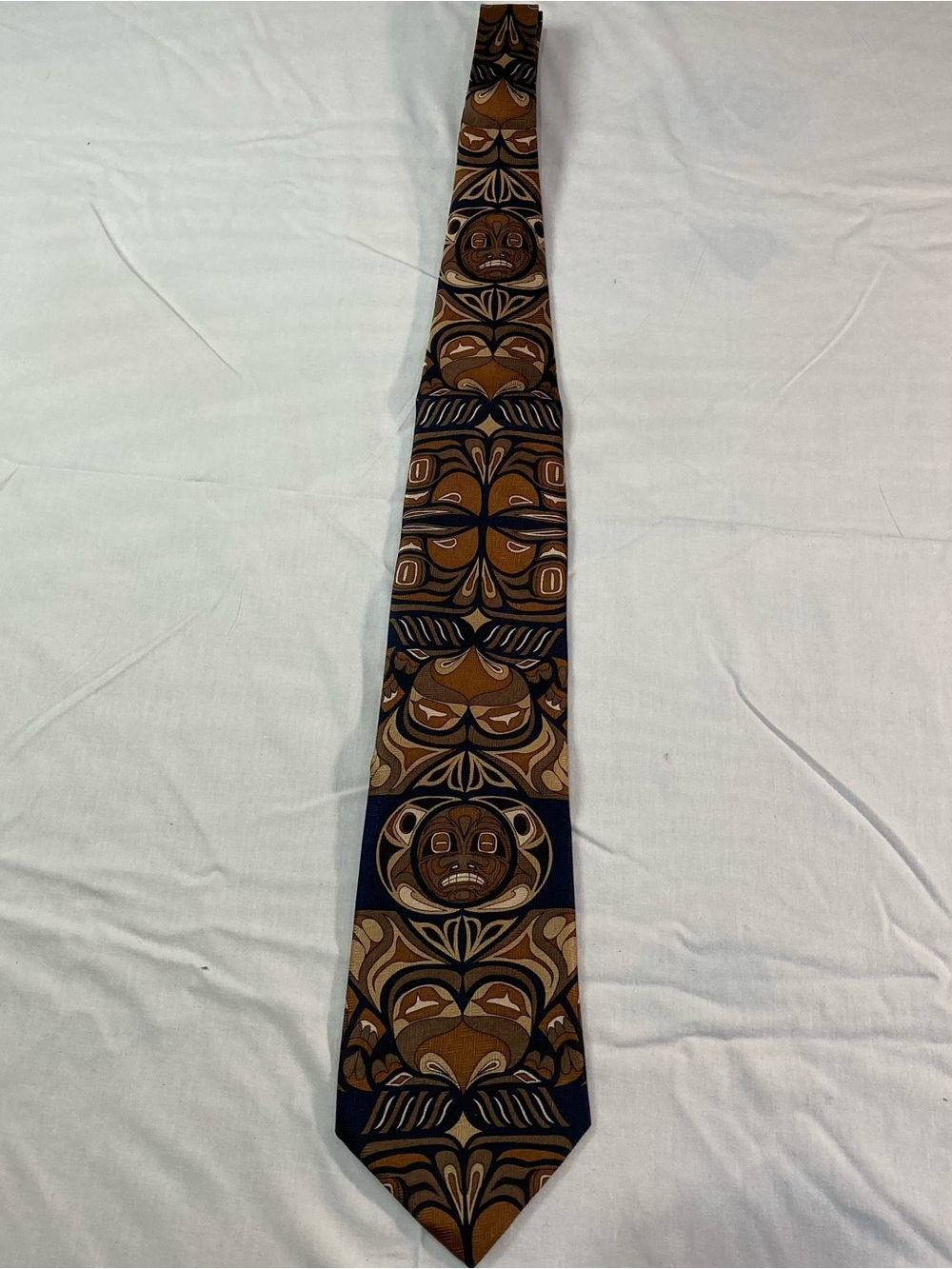 Men's Navy and Brown Patterned Silk Tie with Geometric Motif